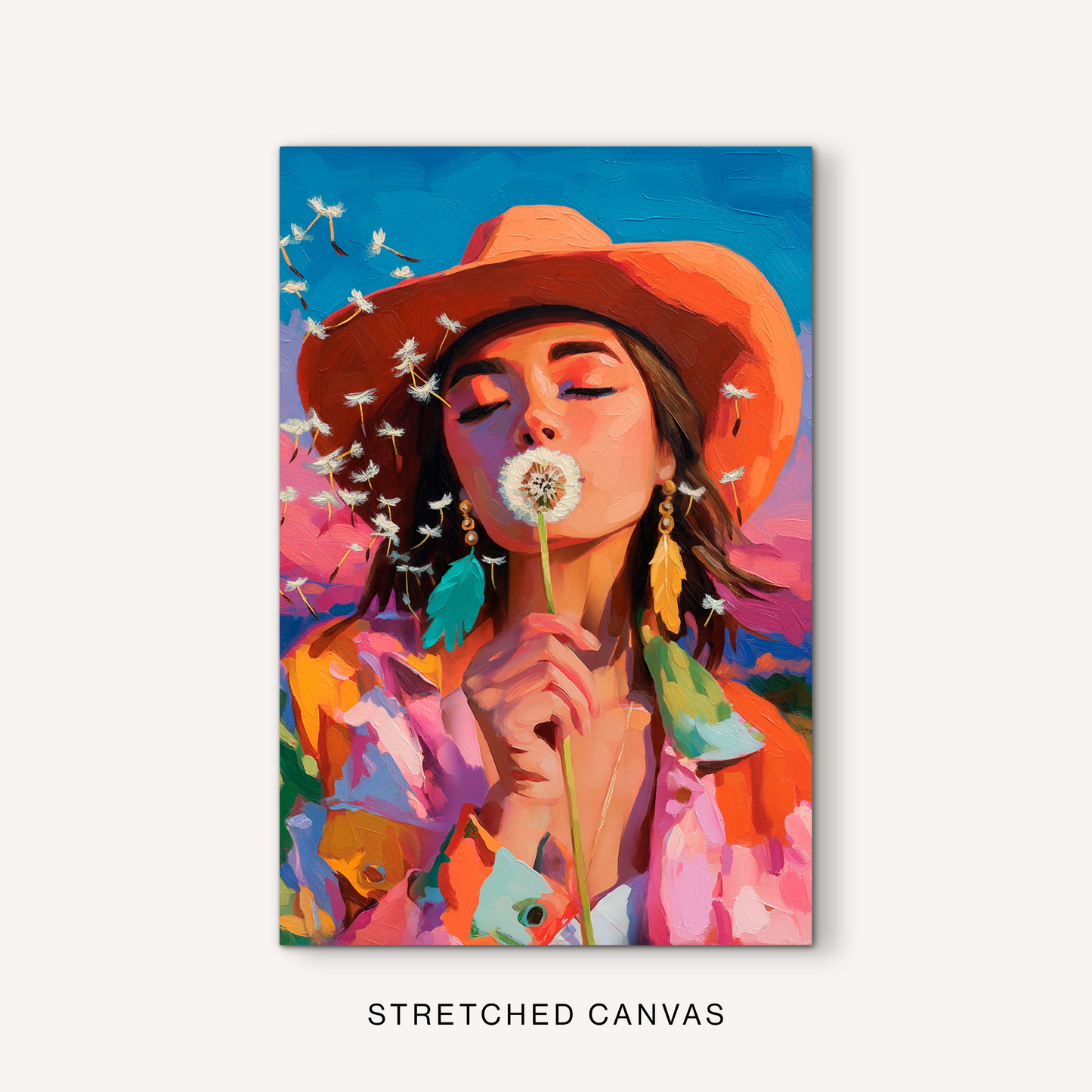Boho cowgirl canvas art with a colorful western portrait, dandelion flower, orange hat, feather earrings, and bold sunset colors.