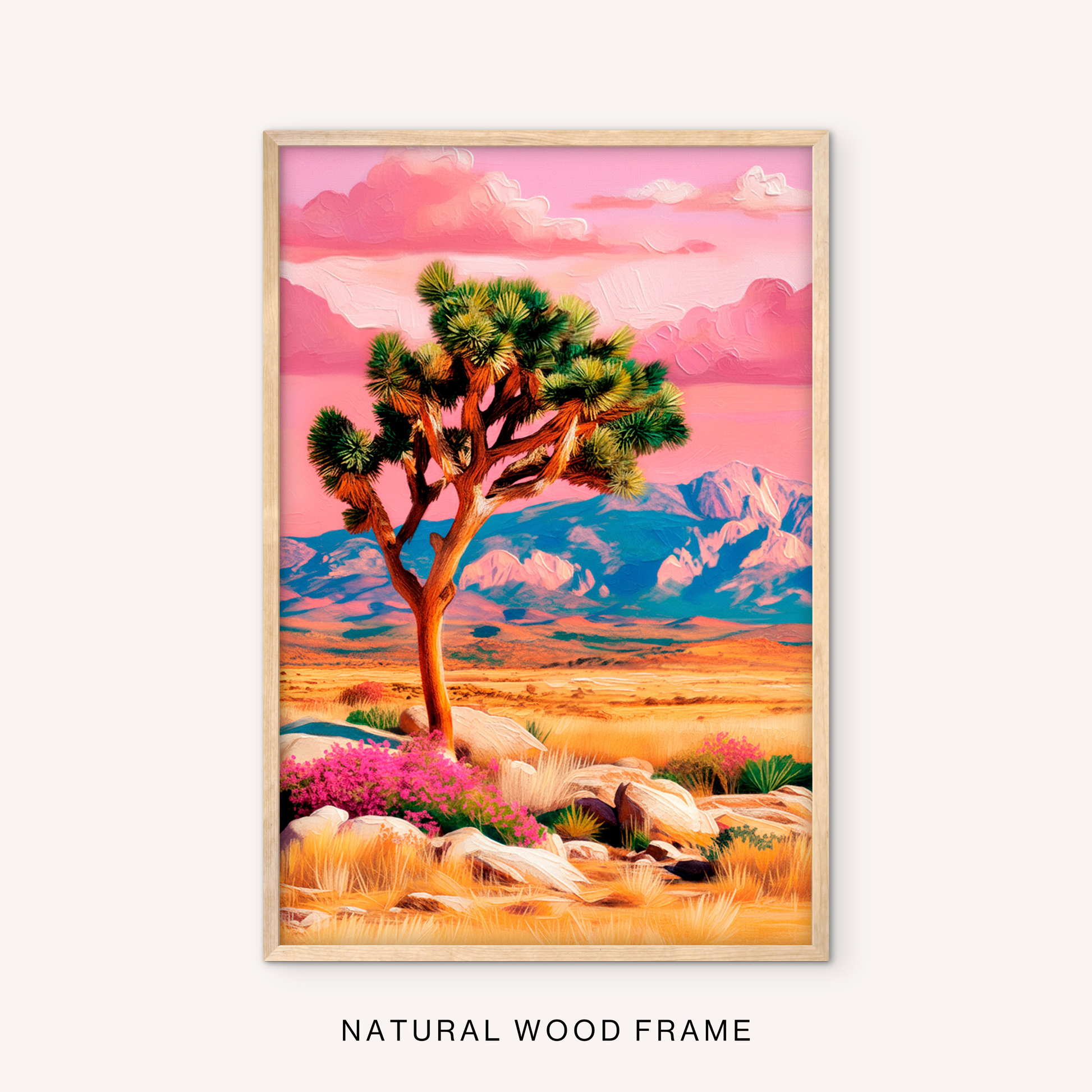 Boho desert wall art in a natural wood frame with a Joshua tree, pink cloud sky, golden desert field, and southwestern mountain landscape.