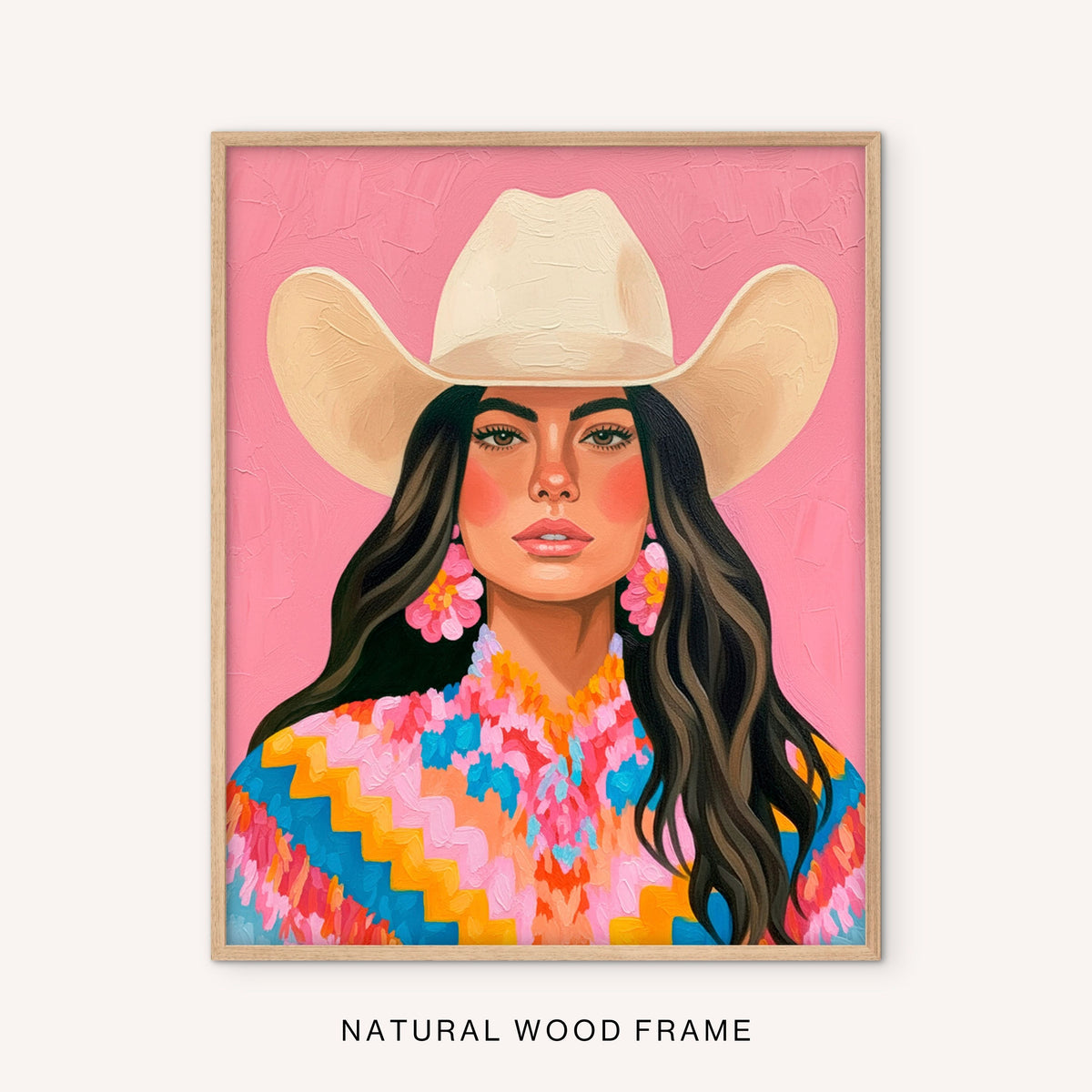 Boho southwestern cowgirl art featuring a dark-haired woman in a western hat and colorful sweater, displayed in a natural wood frame on white.