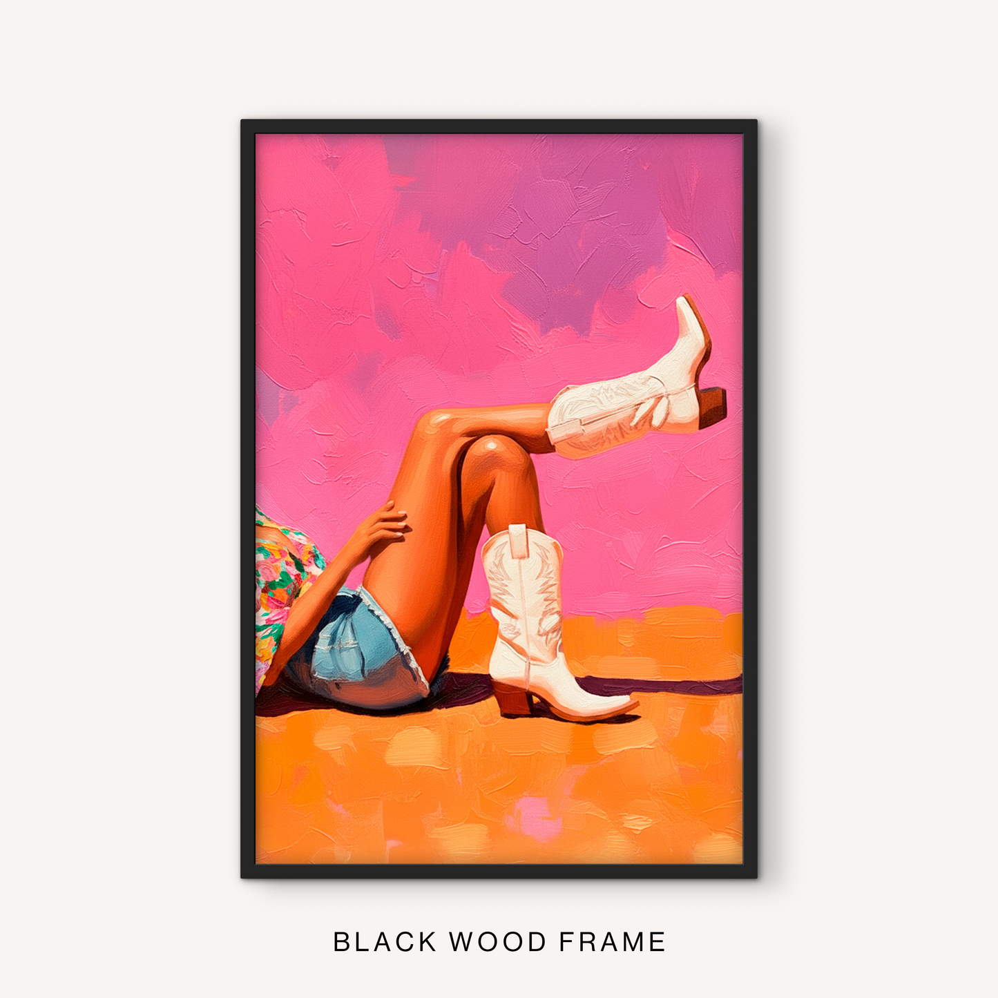 Bold western boots print in a black frame featuring white cowgirl boots, hot pink background, orange tones, and playful western wall decor.