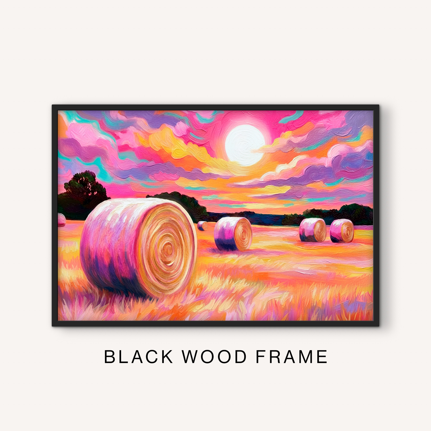 Bold western field print in a black frame featuring colorful hay bales, pink and orange sunset clouds, and a warm ranch pasture scene.