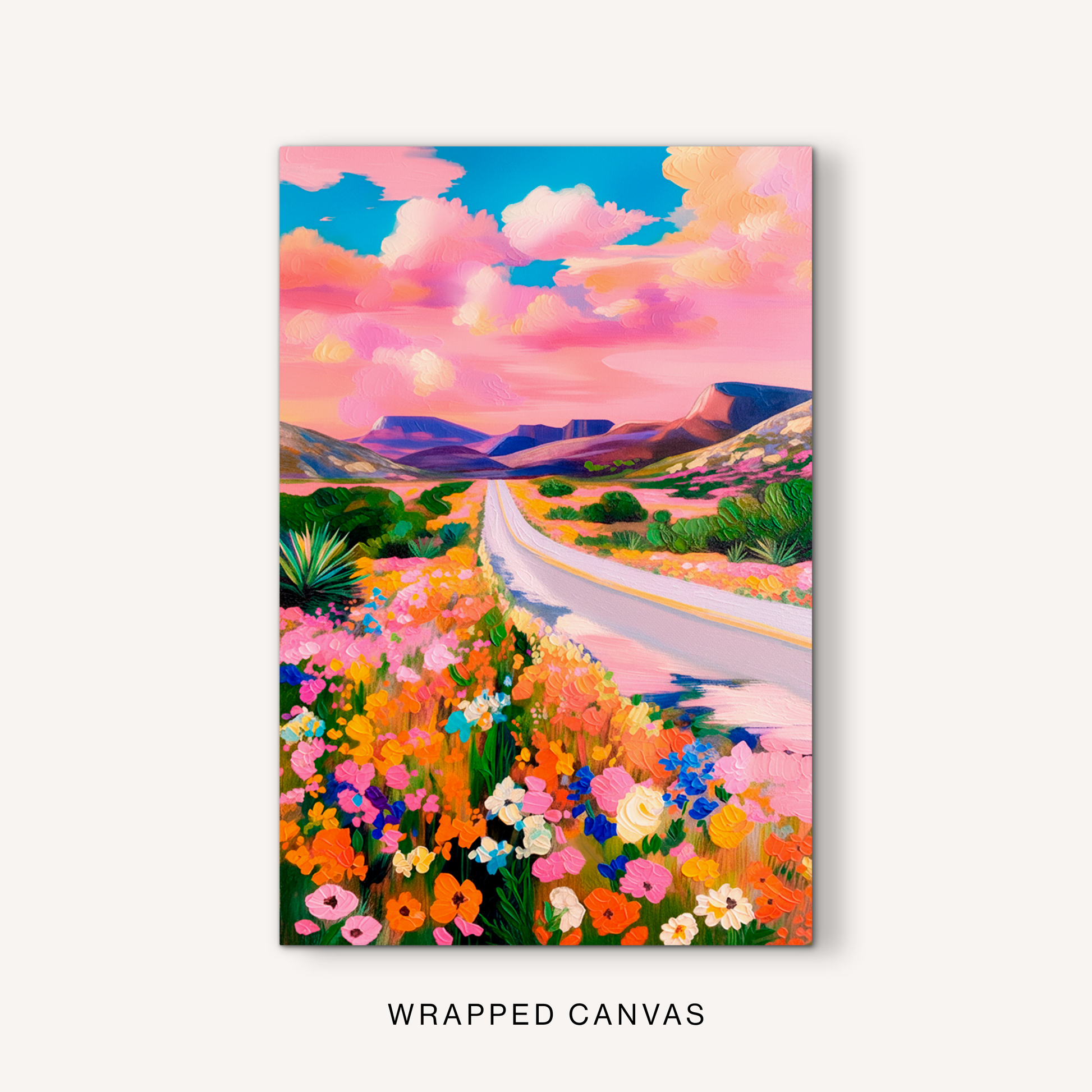Gallery-wrapped canvas wall art featuring a vibrant Southwest road scene with flowers, mesas, and glowing skies.
