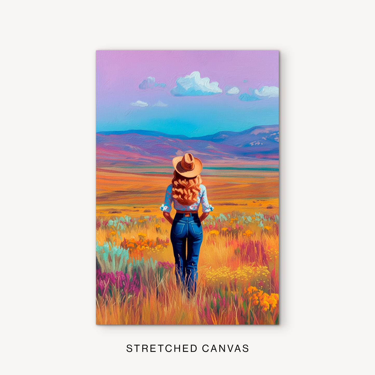 Colorful western canvas art with a cowgirl overlooking a mountain ranch landscape, golden meadow, and bright wildflowers.
