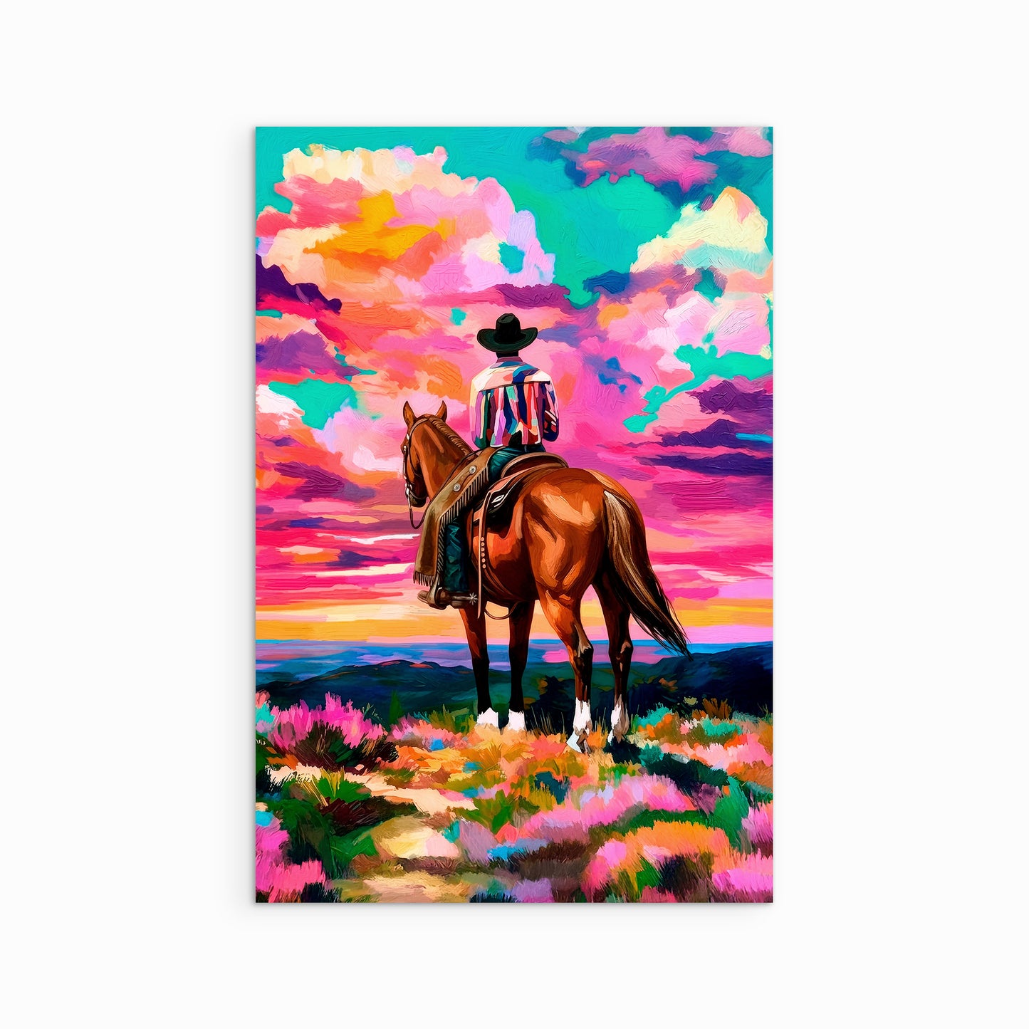 Colorful western art print of a cowboy on horseback overlooking a vibrant sunset landscape with dramatic skies