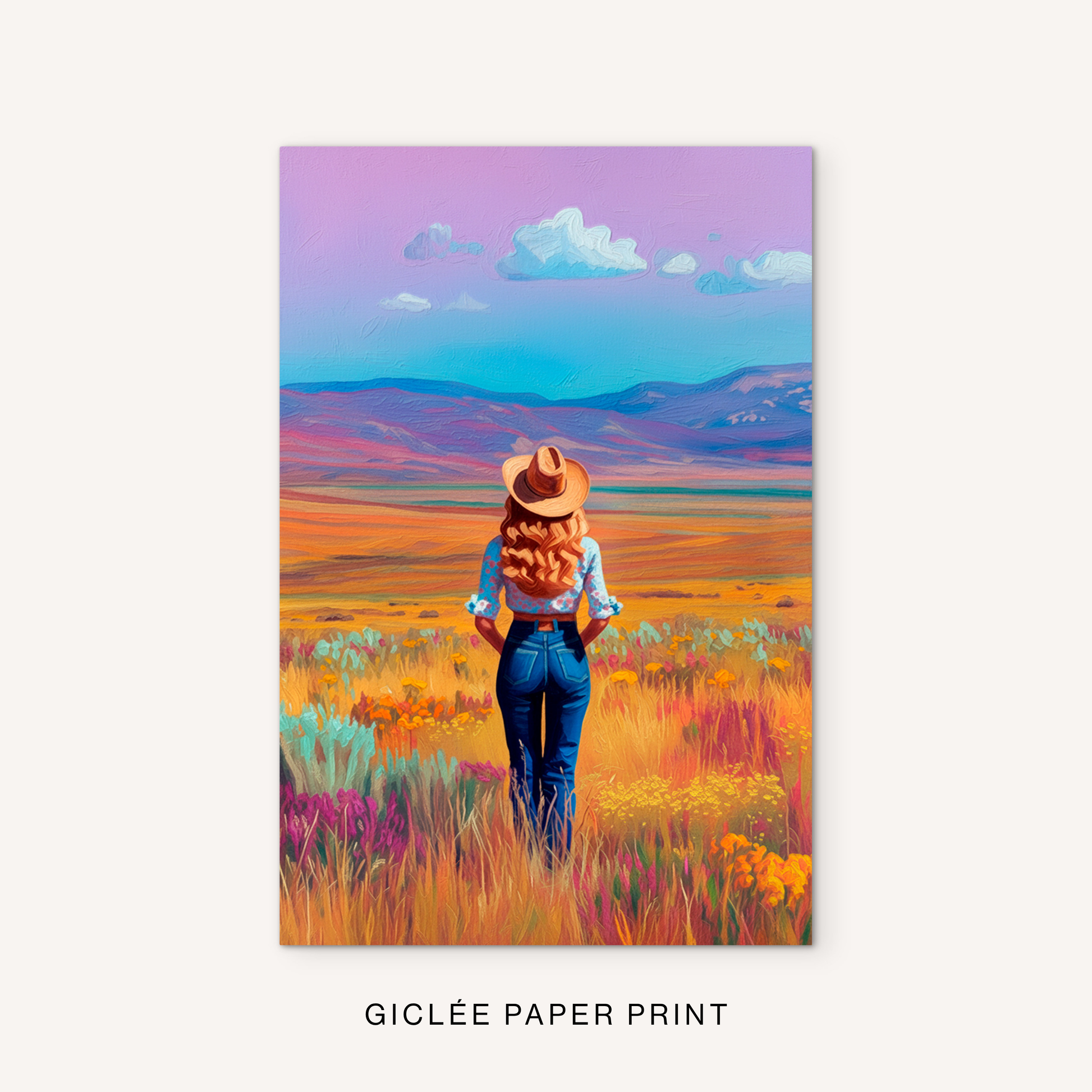 Cowgirl landscape giclée print featuring a western wildflower field, colorful prairie grass, distant mountains, and soft pastel sky.