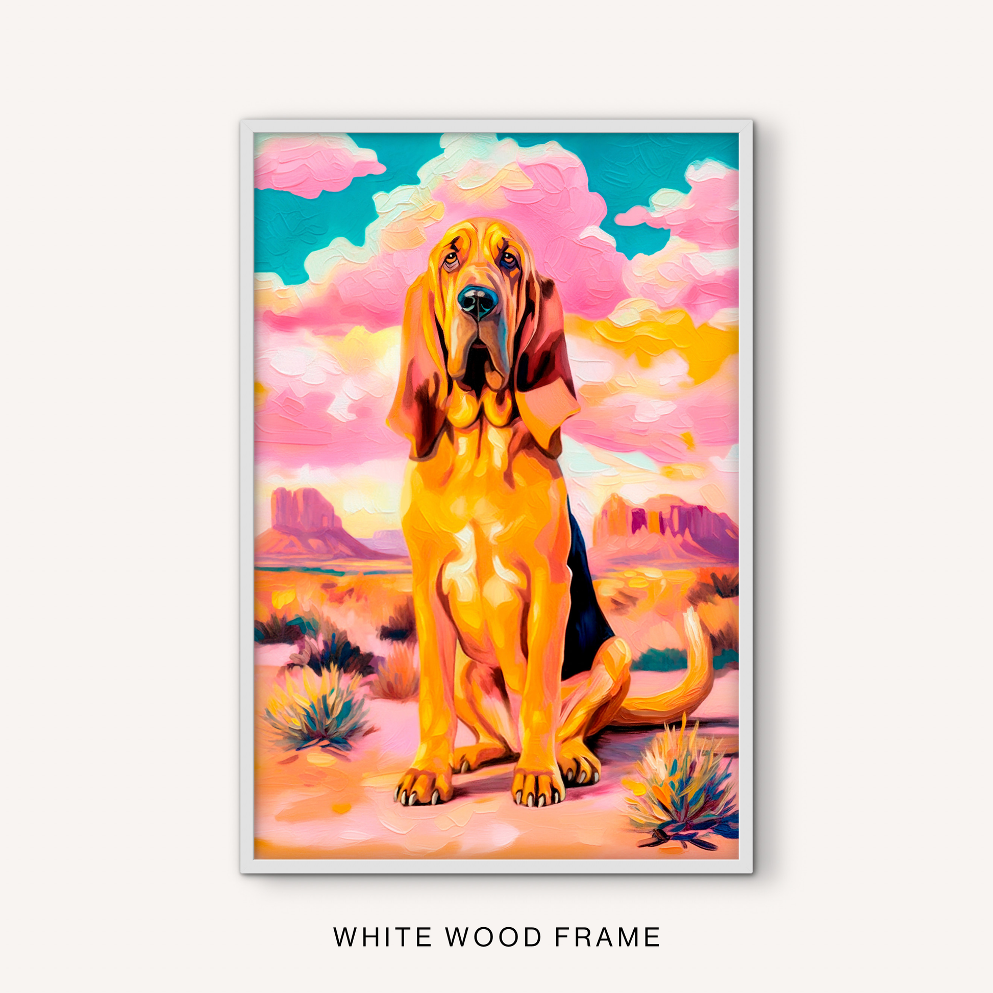 Western bloodhound wall art in a white frame with a colorful desert background, pink sky, and bright southwest dog portrait