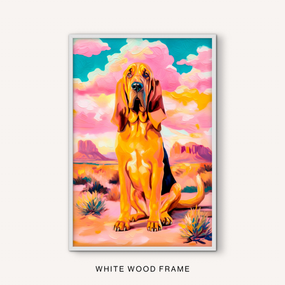 Western bloodhound wall art in a white frame with a colorful desert background, pink sky, and bright southwest dog portrait