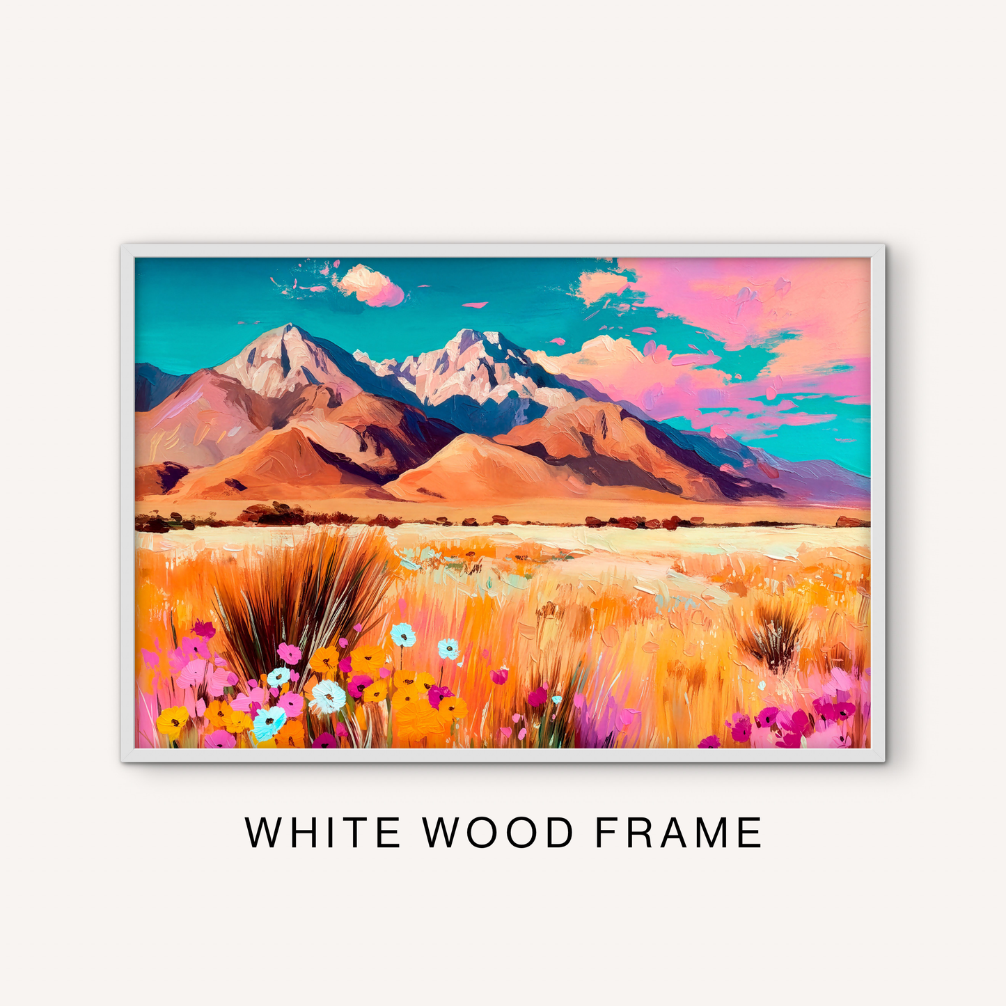Colorful western mountain wall art in a white frame with wildflower meadow details, golden grass, turquoise sky, and ranch-inspired scenery.
