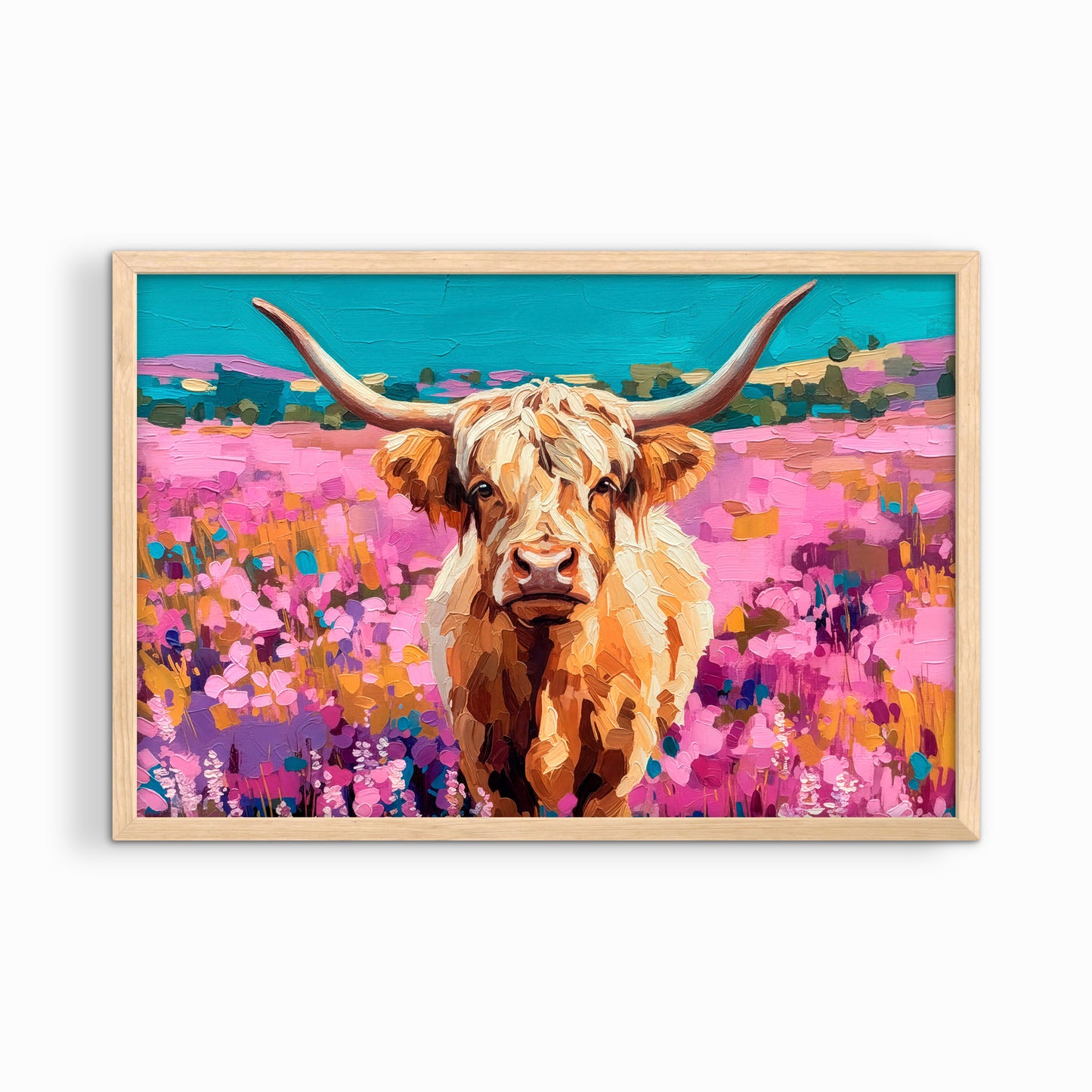Highland cow wall art in natural wood frame with warm tones and colorful wildflowers, rustic western decor