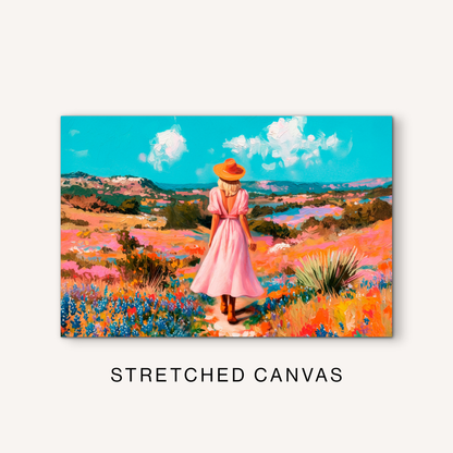 Horizontal cowgirl canvas art with a bright western meadow, colorful wildflowers, rolling hills, blue sky, and ranch-inspired scenery.
