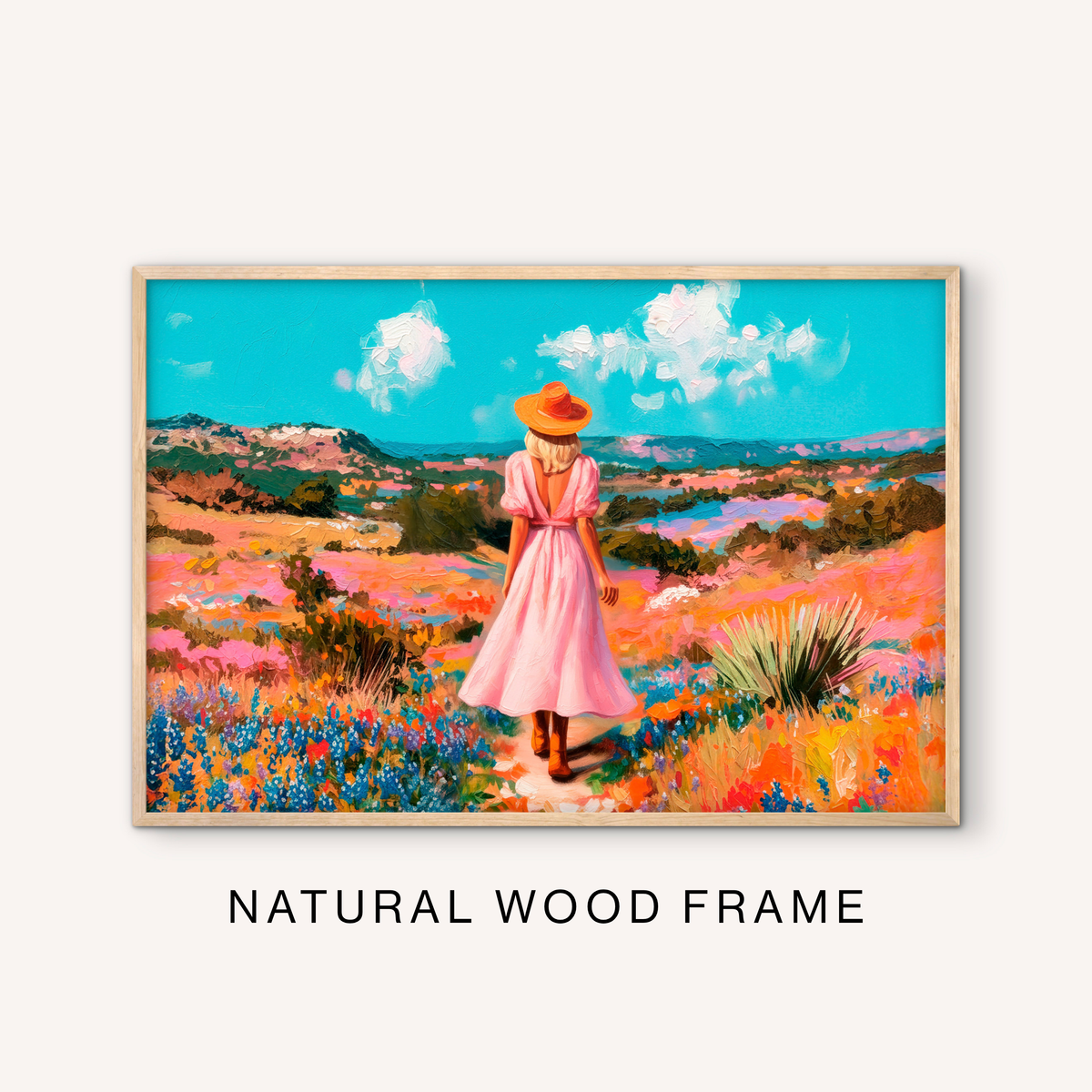 Ranch meadow wall art in a natural wood frame with a cowgirl figure, bright wildflowers, rolling western hills, and open sky scenery.