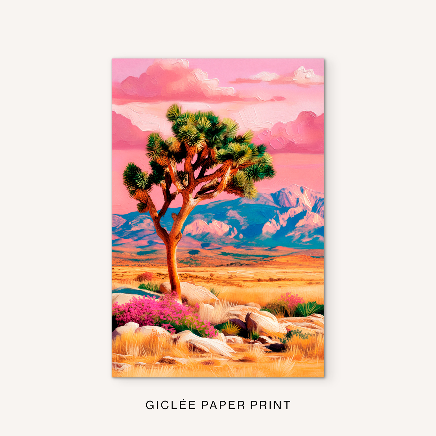 Southwestern Joshua tree giclée print featuring a colorful desert landscape, pink clouds, distant mountains, and warm golden desert tones.