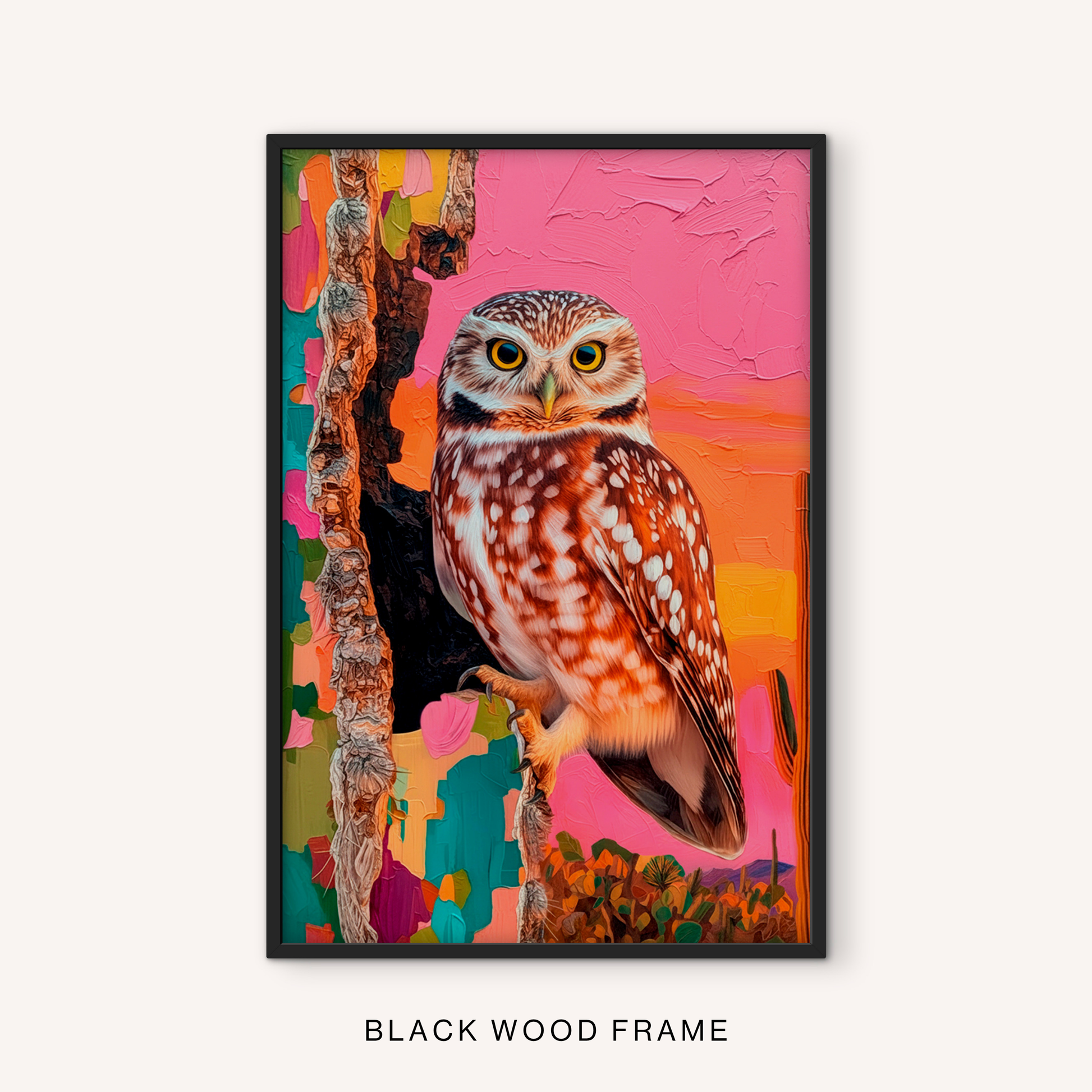 Colorful owl wall art in a black frame featuring a vibrant southwestern owl painting and bold wildlife-inspired colors.