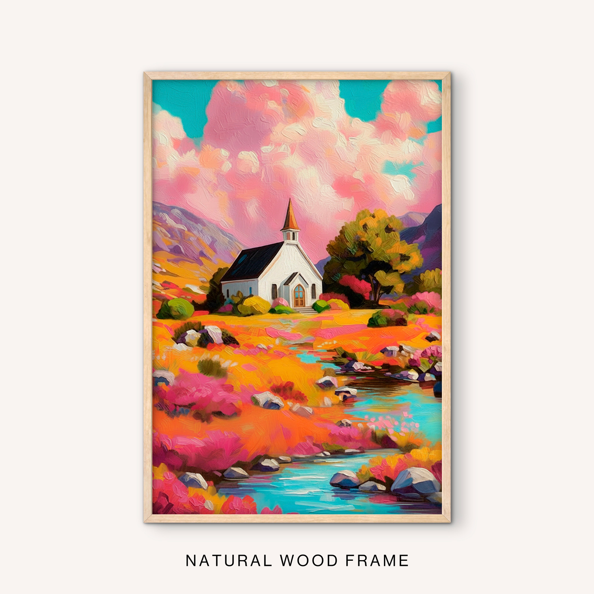 Colorful church landscape print in natural wood frame featuring a white chapel, flowing stream, mountain scenery, and vibrant meadow.